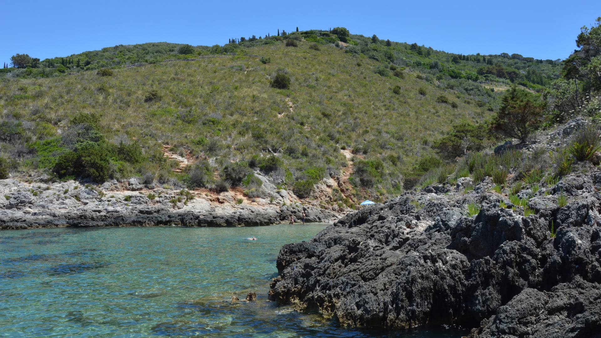 The cliffs and blue sea of La Cacciarella, in the Argentario
