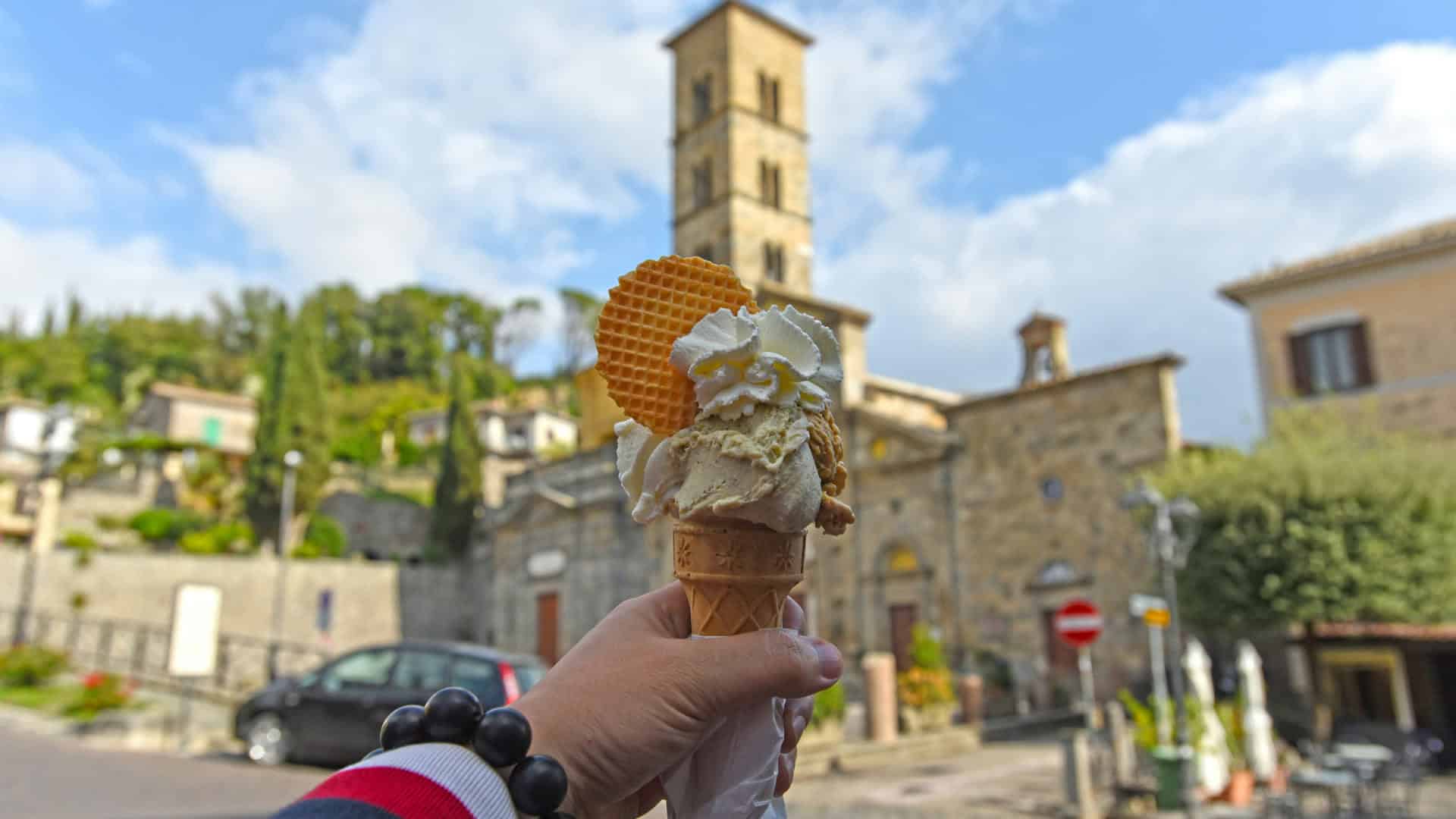 A hand holding an artisanal ice cream